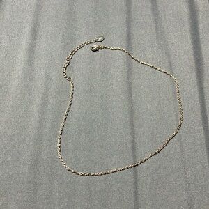Claire’s silver tone necklace.